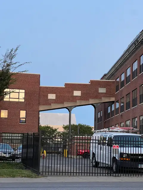 Urban angles and brickwork bathed in soft light.